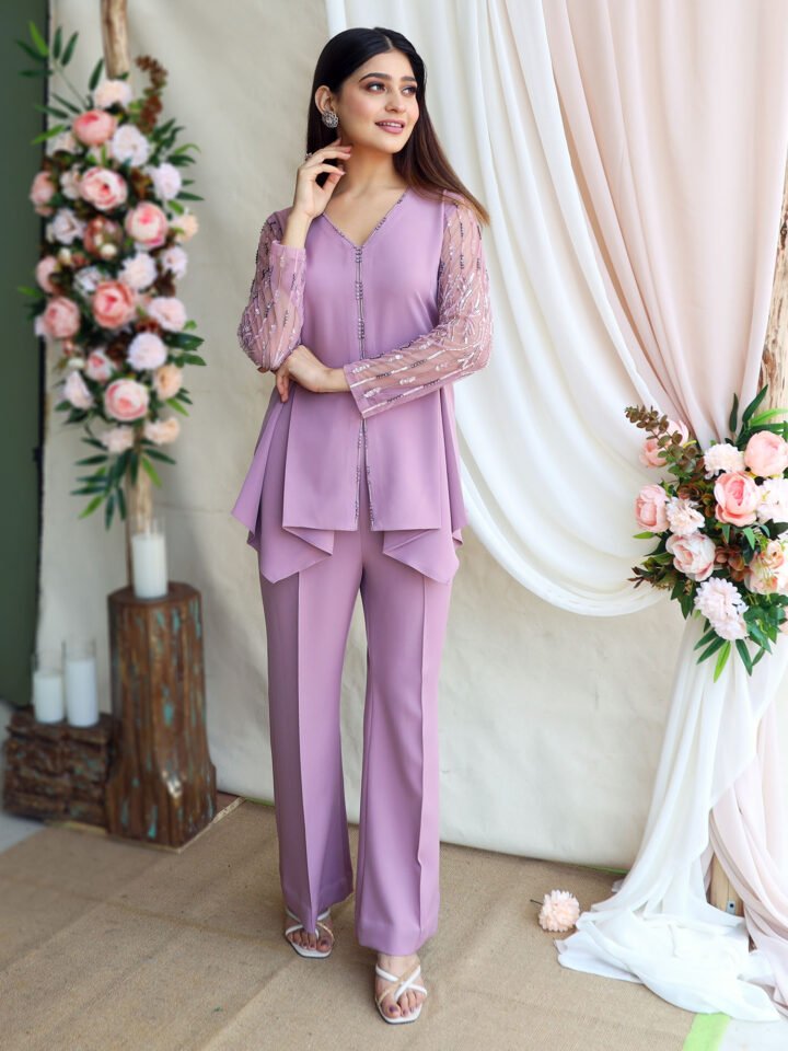 Mouve lycra crepe top with hand embroidered Tulle sleeves paired with bell bottom pants