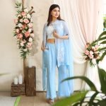 Organza Cape with thread and hand embroideryroider with lace bustier paired with organza bell bottoms