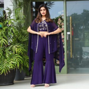 Organza Cape with hand embroidered detailing paired with a royal georgette hand embroidred bustier and flared pants